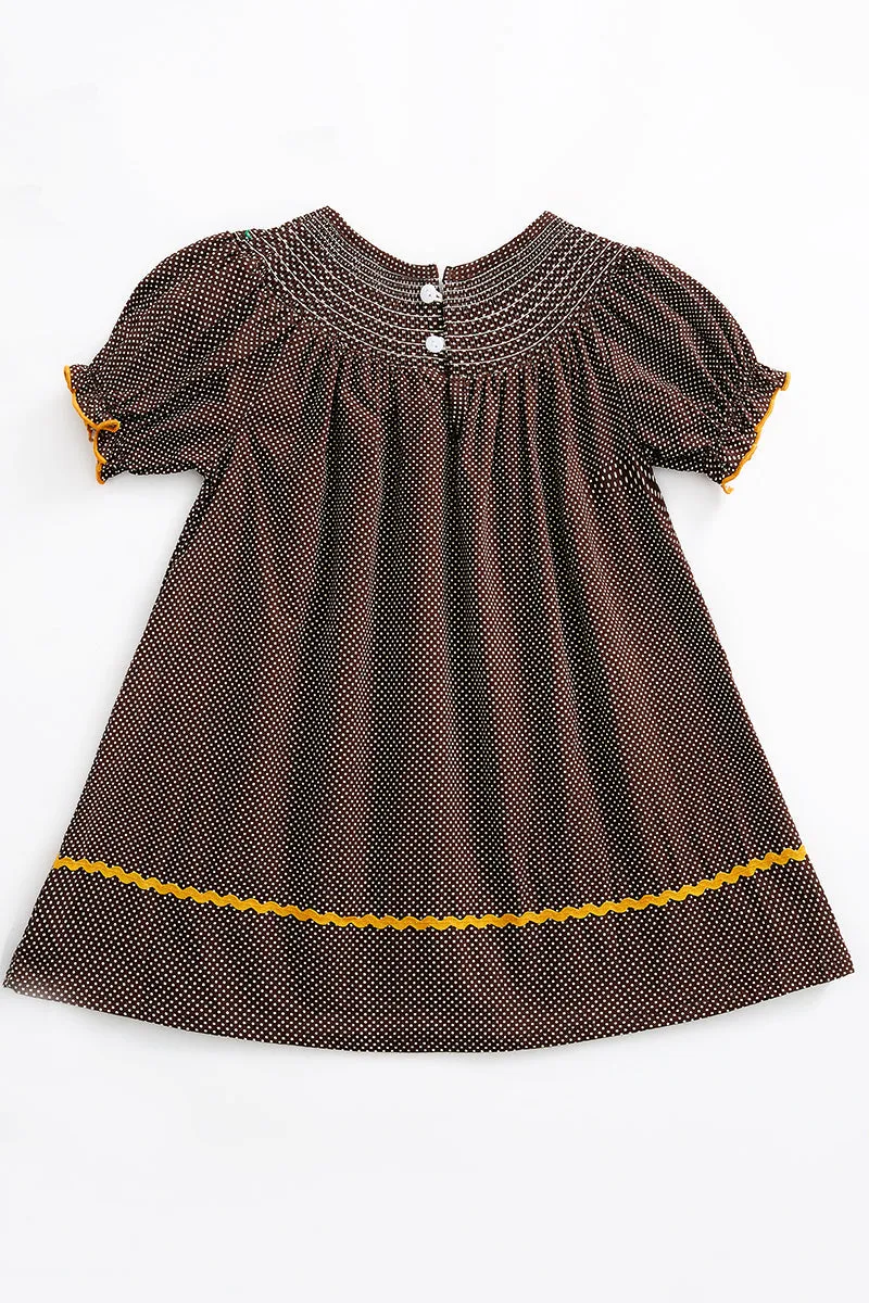 Brown pumpkin smocked polkadot sleeve dress