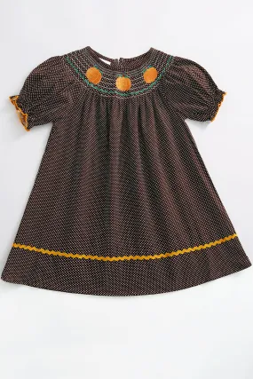 Brown pumpkin smocked polkadot sleeve dress